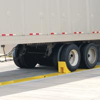 AC Series AUTO CHOCK® In-Ground Wheel Restraint